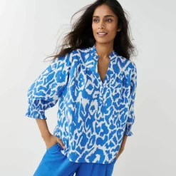 Blouse bicolore col tunisien, manches coudes smockées