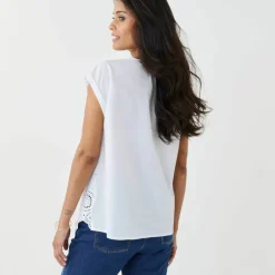 Blouse en broderie anglaise, sans manches
