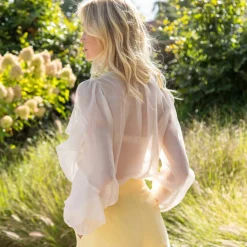 Blouse fluide à volants asymétriques, unie