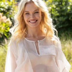 Blouse fluide à volants asymétriques, unie