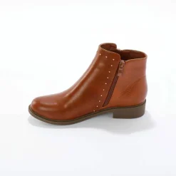 Boots bi-matière, zippées et cloutées