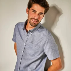 Chemise unie manches courtes