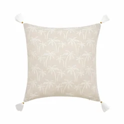 Coussin imprimé palmiers et pompons