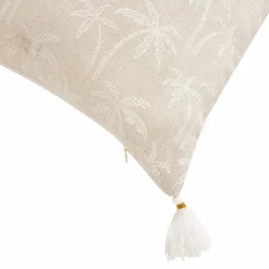 Coussin imprimé palmiers et pompons