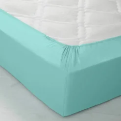Drap-housse uni coton bonnet 32 cm