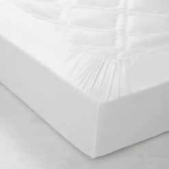 Drap-housse uni polyester-coton 57 fils/cm² - bonnet 32 cm