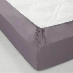 Drap-housse uni polyester-coton 57 fils/cm² - bonnet 32 cm