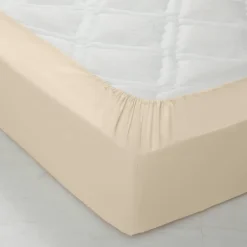 Drap-housse uni polyester-coton 57 fils/cm² - bonnet 32 cm