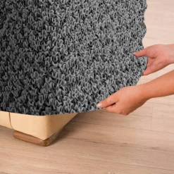 Housse bi-extensible microfibre effet faux uni pour fauteuil et canapé