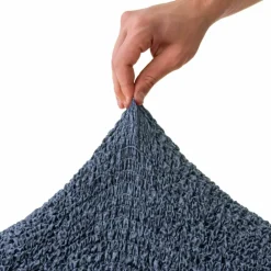 Housse bi-extensible microfibre effet faux uni pour fauteuil et canapé