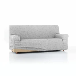 Housse extensible motif jacquard "serpentins" pour fauteuil et canapé