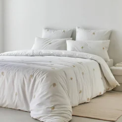 Linge de lit blanc brodé fleurs Colombine®