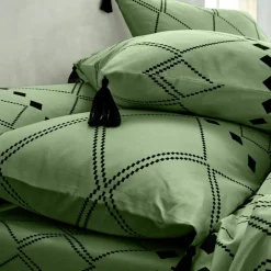 Linge de lit Massaï coton à motifs graphiques et finitions pompons