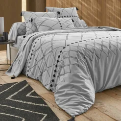 Linge de lit Massaï coton à motifs graphiques et finitions pompons