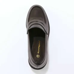 Mocassins à talon en cuir, semelle crantée.