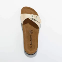 Mules plates cuir à boucle réglable