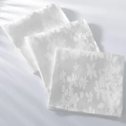 Nappe damassée feuillages Colombine®