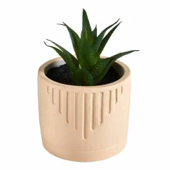 Plante verte artificielle et pot en ciment