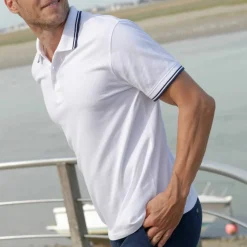 Polo uni maille piquée manches courtes