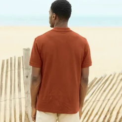 Polo uni maille piquée manches courtes