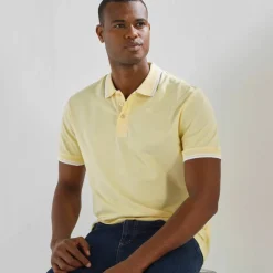Polo uni maille piquée manches courtes