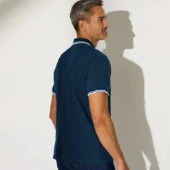 Polo uni maille piquée manches courtes