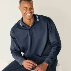 Polo uni maille piquée manches longues