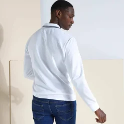 Polo uni maille piquée manches longues