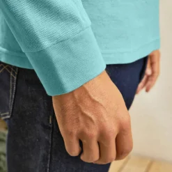 Polo uni maille piquée manches longues