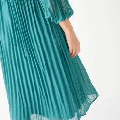 Robe unie mi longue, voile plissé