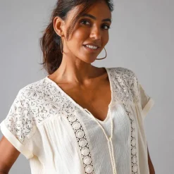 Tunique unie, dentelle et crépon